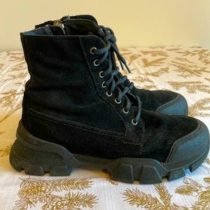 Aquatalia moto boots with gun metal buckle and quilted design.